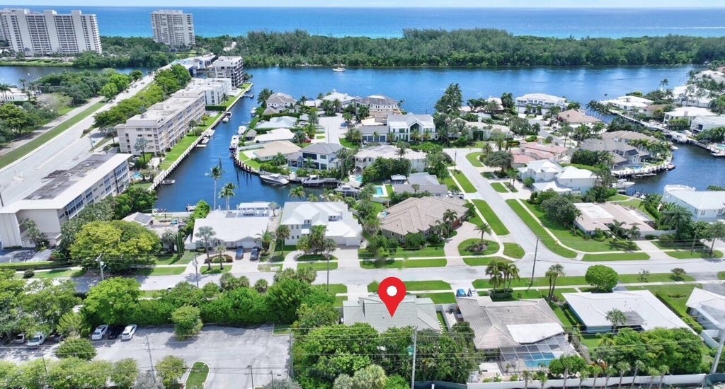 Photo of 3841 NE 6TH Drive, Boca Raton, FL 33431 (MLS # B26078393)