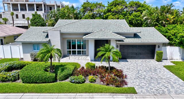 Photo of 3841 NE 6TH Drive, Boca Raton, FL 33431 (MLS # B26078393)
