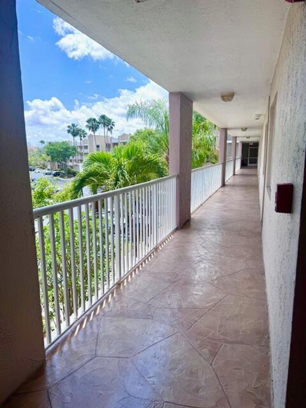 Photo of 9580 Weldon Circle #K304, Tamarac, FL 33321 (MLS # B26021366)