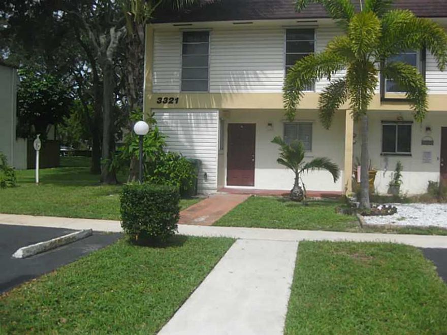 Desirable Hollywood Gardens 3 bedroom 2.5 bath, open kitchen to Large living/dining room combo, tile throughout, washer dryer private yard, Close to T.Y. park. Call today. FIRST-LAST-SECURITY,Background check, Condo association approval a must