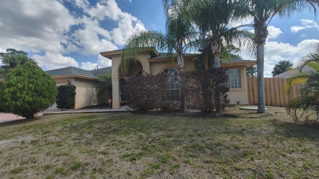Photo of 949 SW College Park Road, Port Saint Lucie, FL 34953 (MLS # R11021369)
