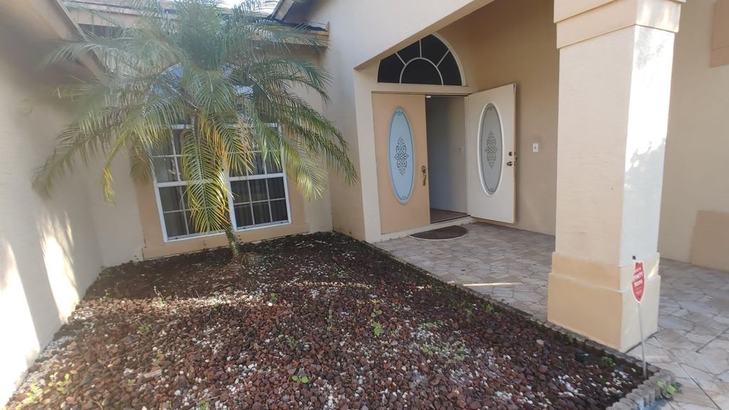 Photo of 949 SW College Park Road, Port Saint Lucie, FL 34953 (MLS # R11021369)