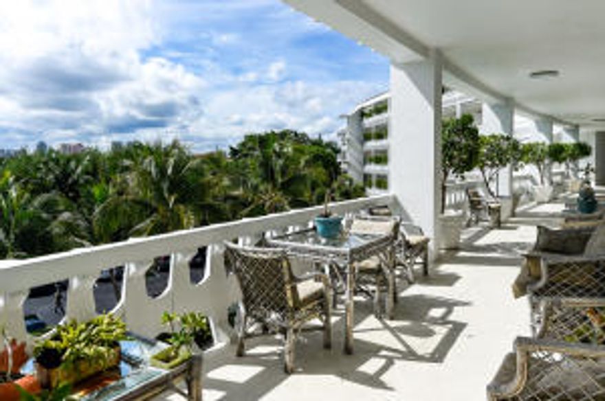 Incredible opportunity!  Rarely available southeast corner unit with 2,042 sq. ft., open plan living/dining and oceanfront loggia.  Located in chic mid-century, oceanfront building with doorman, garage parking, gym and pool.  Pet-friendly.