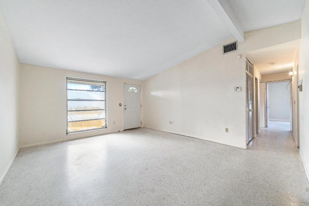 Photo of 555 SE Airoso Boulevard, Port Saint Lucie, FL 34983 (MLS # R11152411)