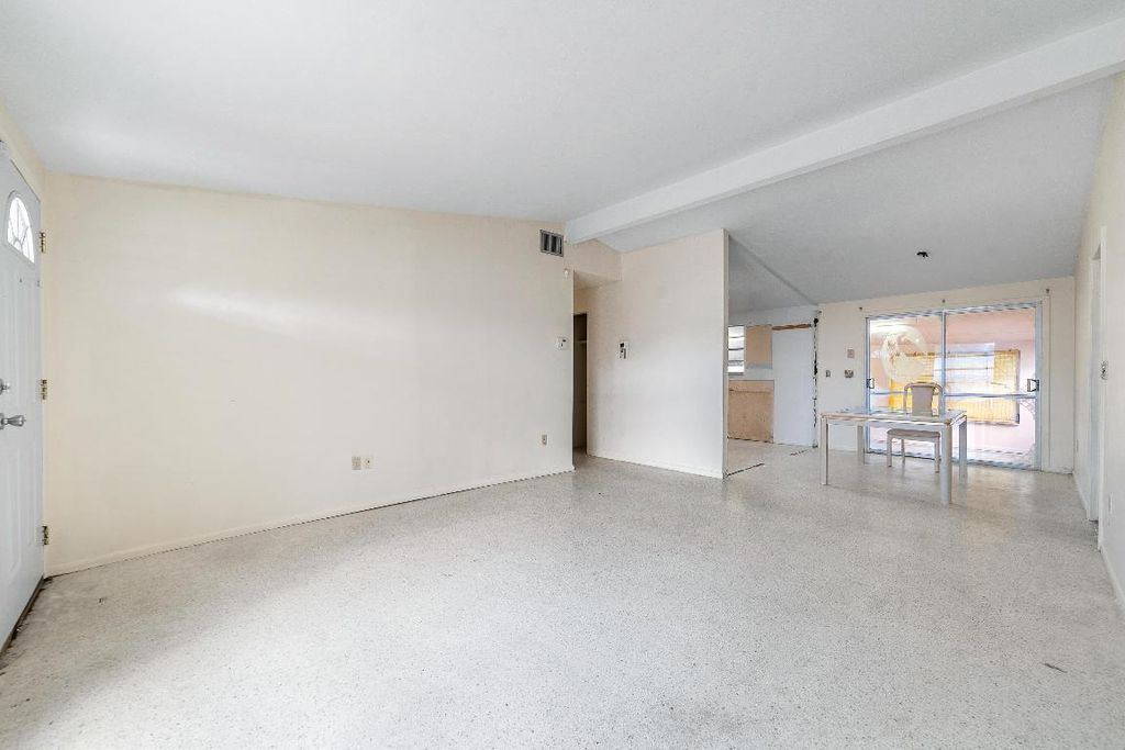 Photo of 555 SE Airoso Boulevard, Port Saint Lucie, FL 34983 (MLS # R11152411)