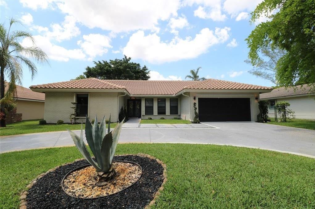 Photo of 10859 NW 14th Street, Coral Springs, FL 33071 (MLS # F10535931)