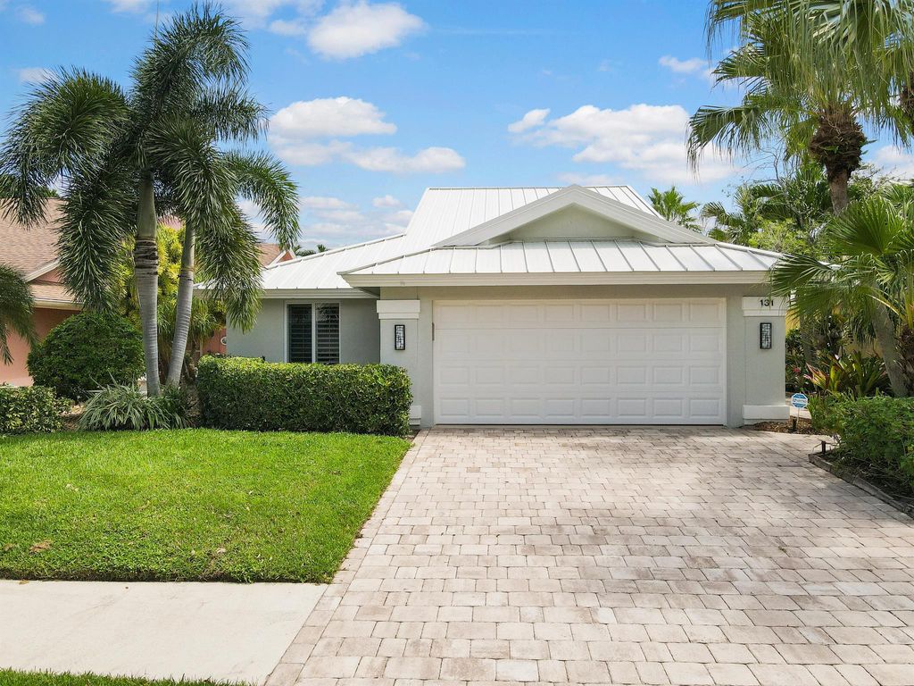 Photo of 131 Sand Pine Drive, Jupiter, FL 33477 (MLS # R10916037)