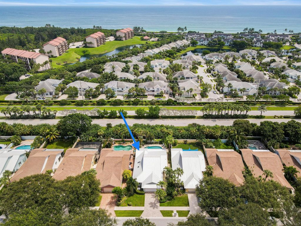 Photo of 131 Sand Pine Drive, Jupiter, FL 33477 (MLS # R10916037)