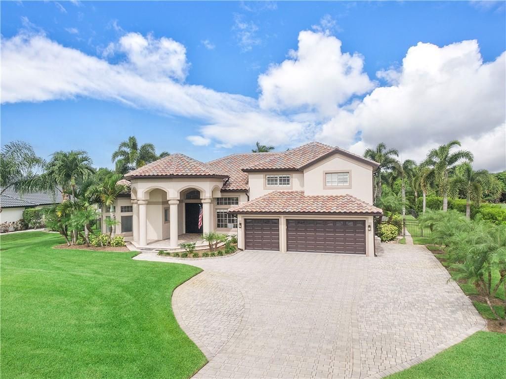 Photo of 1328 SW Squire Johns Ln, Palm City, FL 34990 (MLS # F10386267)