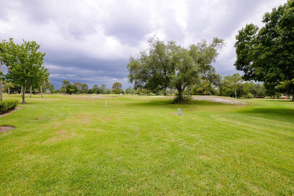Photo of 9440 Meadowood Drive #102, Fort Pierce, FL 34951 (MLS # R11092632)