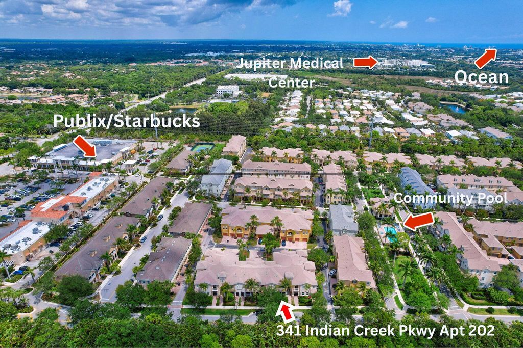 Photo of 341 Indian Creek Parkway #202, Jupiter, FL 33458 (MLS # R11088677)