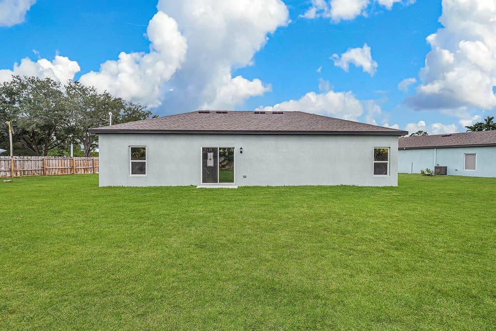 Photo of 498 SW Prater Avenue, Port Saint Lucie, FL 34953 (MLS # F10513316)