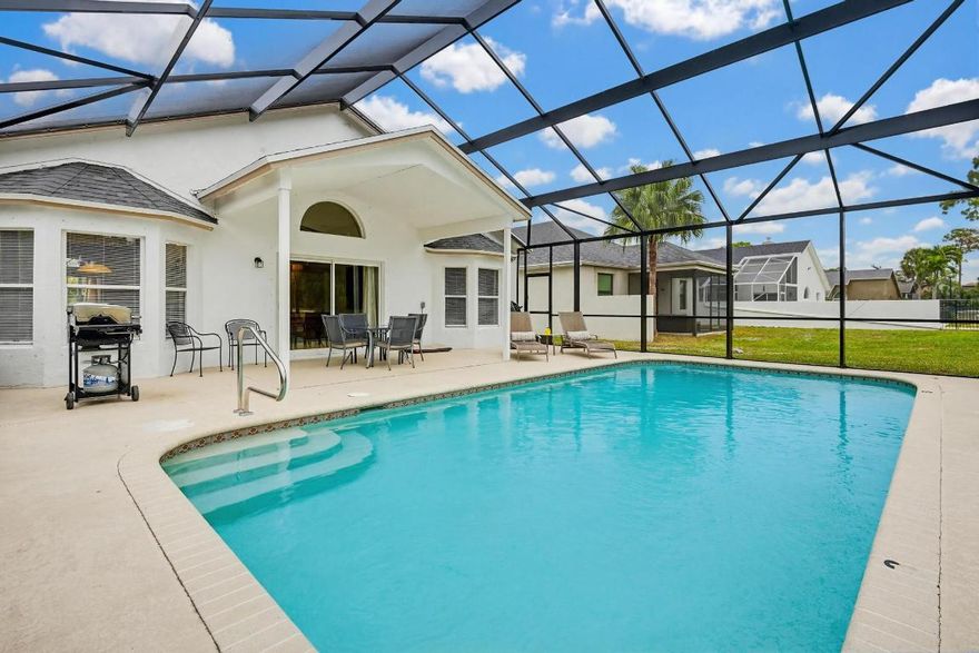 Don't miss this gorgeous two story home — walking distance to ''A'' rated schools — Binks Elementary and Landings Middle School.  Large open floor plan in this fabulous home featuring heated pool with BRAND NEW screen enclosure and BRAND NEW roof.  Stainless steel appliances, granite countertop and all tiled living areas.  Master bedroom downstairs and spacious golf course/preserve view throughout.
Home also features two more bedrooms and bath with a magnificent loft area ideal for an office, gym or playroom.