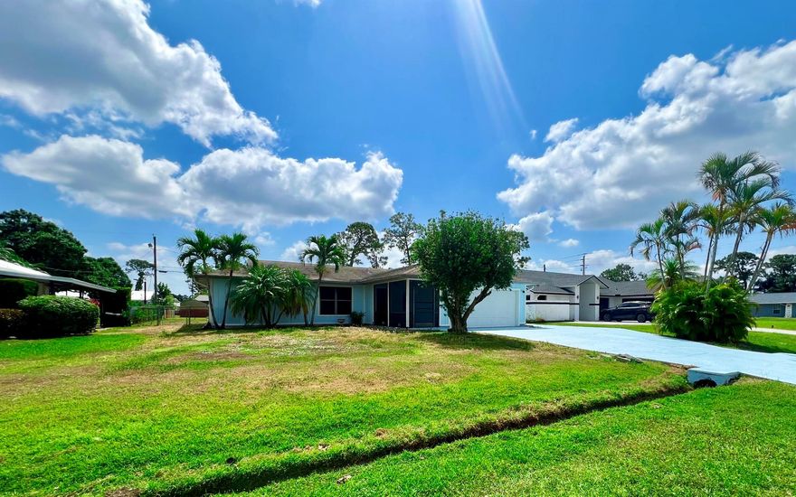 PORT SAINT LUCIECharming 2-bedroom, 2-bathroom home with a 2-car garage, featuring a large screened patio and bonus room for extra living space. Enjoy brand new stainless steel appliances, new front-loading washer & dryer, and an open floor plan that flows beautifully. The fenced backyard offers room for a pool, plus an extra-large cement pad perfect for parking your RV or boat. Ideally located near shopping, dining, and major highways--this home has it all!