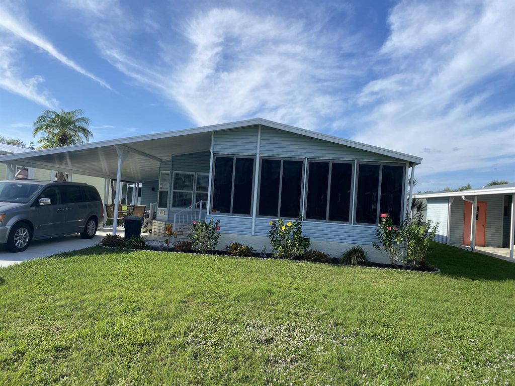 Photo of 6531 Spanish Lakes Boulevard, Fort Pierce, FL 34951 (MLS # R10942837)