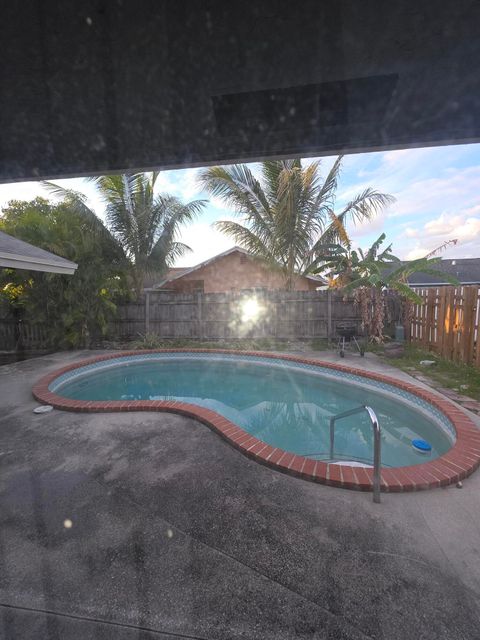 Tiny photo for 8131 SW 4th Street, North Lauderdale, FL 33068 (MLS # B26020157)