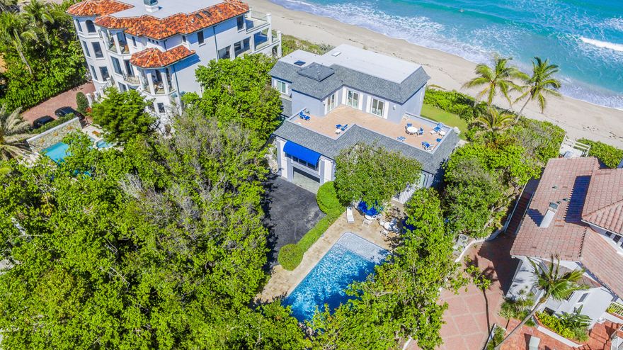 100' OF DIRECT OCEANFRONT WITH EXCLUSIVE AND PRIVATE ACCESS TO PRESTIGIOUS HILLSBORO MILE BEACH. THIS PHENOMENAL 3-STORY WITH PRIVATE ELEVATOR HOME IS LOCATED ON FABULOUS LOT ON THE OCEAN AND INTRACOASTAL, JUST NORTH OF THE INLET ON HILLSBORO MILE, WITH PRIVATE BOAT DOCK. CURRENT BOAT DOCK USED TO HOUSE AN APPROX. 40 FT BOAT. THIS FABULOUS 5 BEDROOMS OCEANFRONT FULLY FURNISHED HOUSE HAS HOSTED MANY CELEBRITIES. 1ST FLOOR FEATURES: PRIVATE HEATED POOL, 2 BEDROOMS ( ONE WITH POOL VIEWS),2 BATHROOMS, LAUNDRY ROOM AND PLAYROOM. SECOND FLOOR: OCEANFRONT LIVING ROOM, KITCHEN, 2 OCEANFRONT BEDROOMS ( BEING ONE A SUITE) & 2 BATHROOMS. 3RD FLOOR: OCEANFRONT MASTER BEDROOM WITH SPACIOUS BALCONY OVERLOOKING THE OCEAN & TERRACE OVERLOOKING THE INTRACOASTAL. * INCOME PROPERTY*RENTED AS VACATION RENTAL*