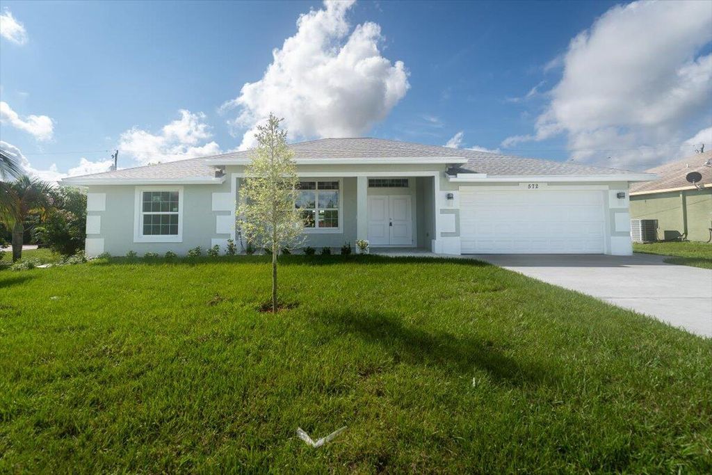 Photo of 572 SW Halden Avenue, Port St Lucie, FL 34953 (MLS # R10920747)