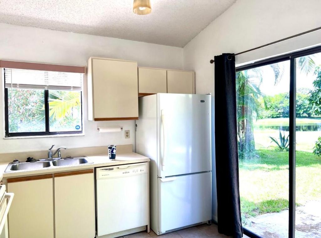 Photo of 11 Mayfield Way, Boynton Beach, FL 33426 (MLS # R11076103)