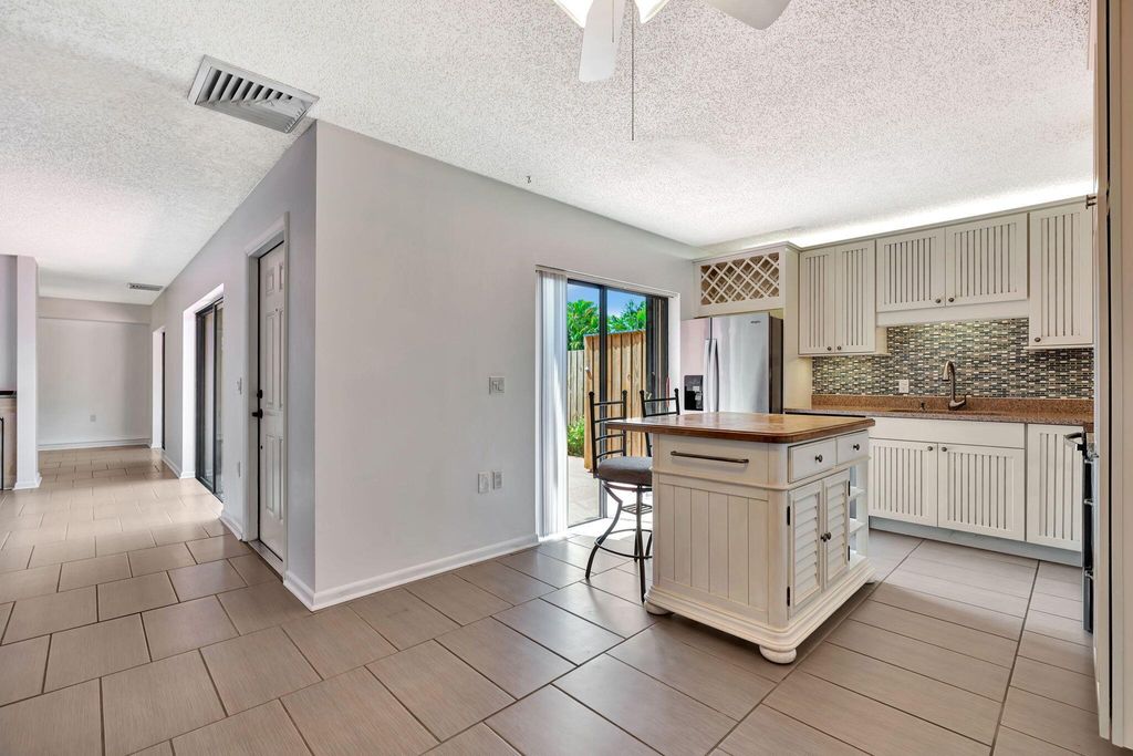 Photo of 1408 14th Lane, Palm Beach Gardens, FL 33418 (MLS # R11080603)