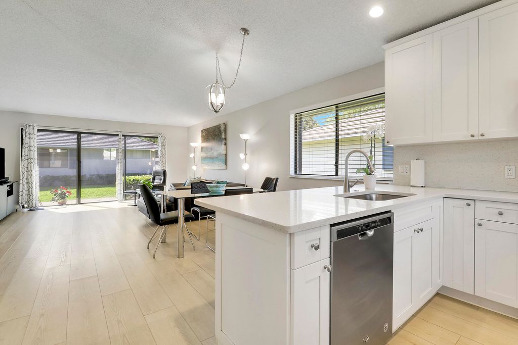 Photo of 811 Club Drive, Palm Beach Gardens, FL 33418 (MLS # B26019667)