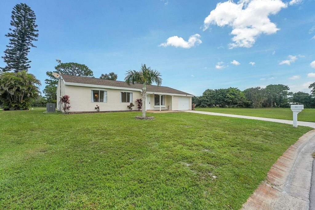Photo of 2073 SE Talwood Lane, Port St Lucie, FL 34952 (MLS # R11119728)