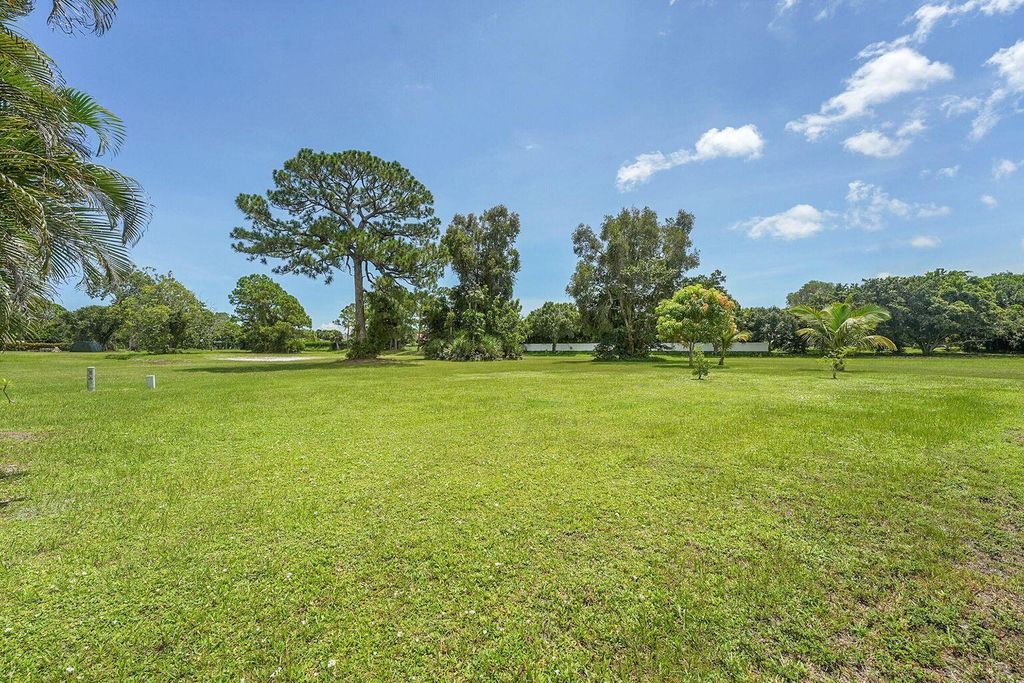 Photo of 2073 SE Talwood Lane, Port St Lucie, FL 34952 (MLS # R11119728)