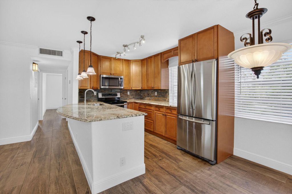 Photo of 22 Normandy A, Delray Beach, FL 33484 (MLS # B26029071)