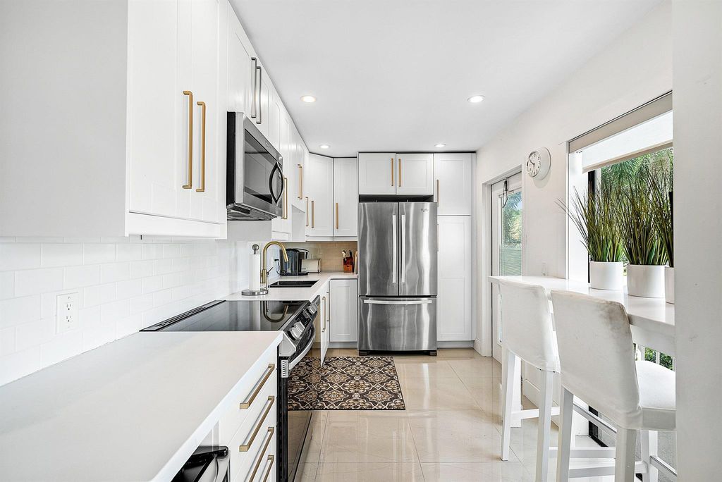 Photo of 4217 B Quail Ridge Drive #Sandpiper, Boynton Beach, FL 33436 (MLS # R11134421)