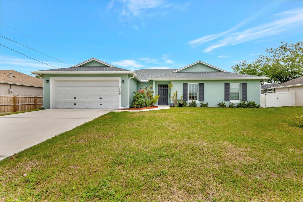 Photo of 3849 SW Laidlow Street, Port Saint Lucie, FL 34953 (MLS # R11079888)