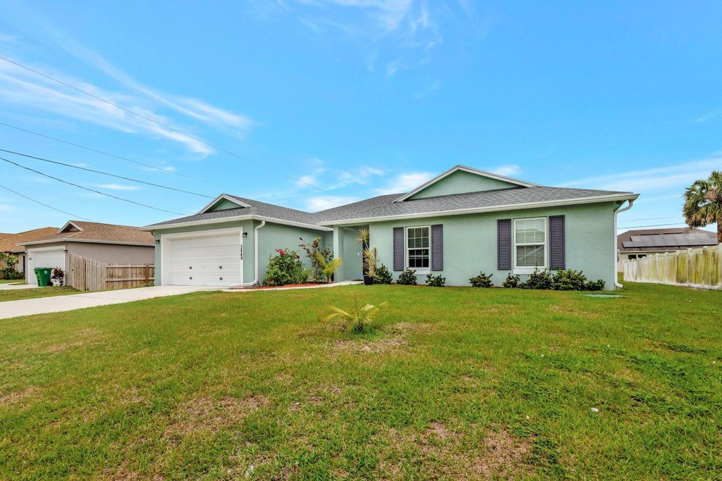 Photo of 3849 SW Laidlow Street, Port Saint Lucie, FL 34953 (MLS # R11079888)