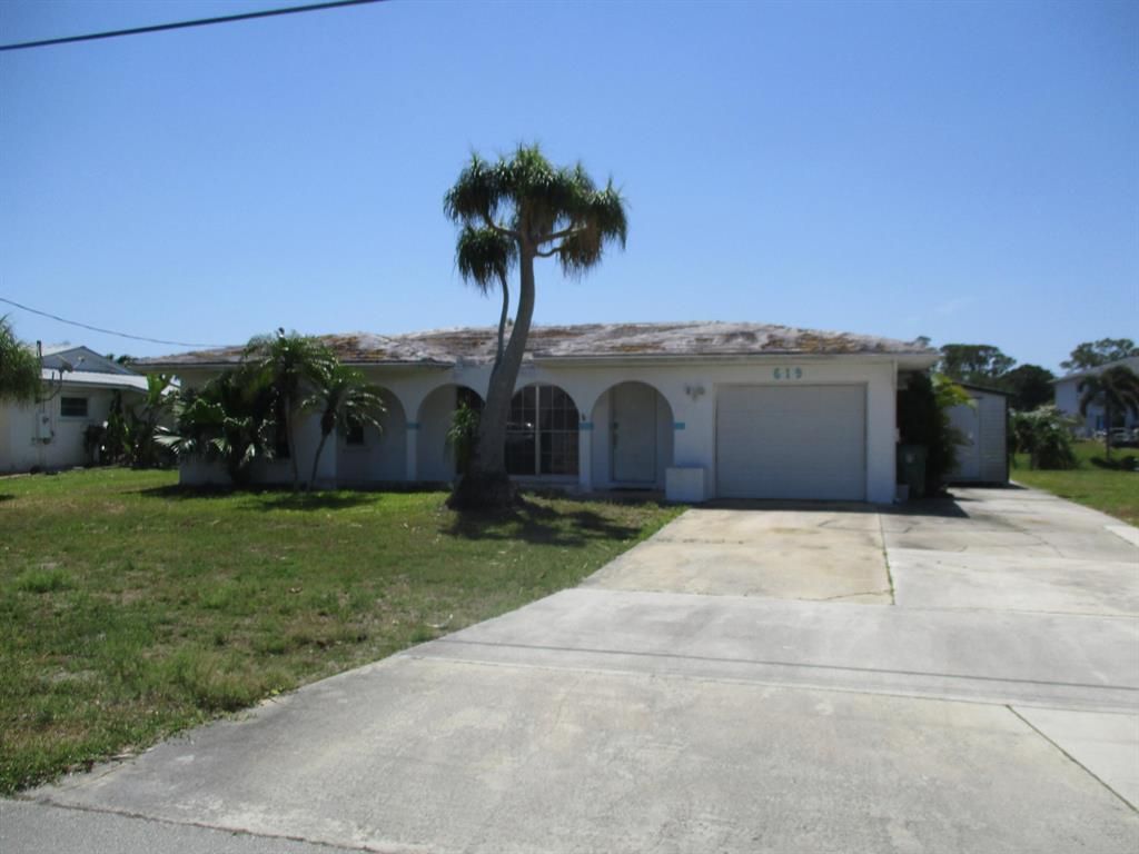 Photo of 619 SE Calmoso Drive, Port Saint Lucie, FL 34983 (MLS # R10708225)