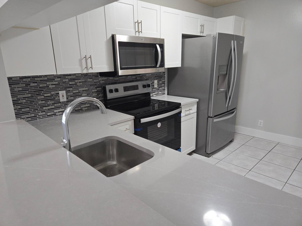 Photo of 1861 SW 116TH Way, Miramar, FL 33025 (MLS # B26066599)
