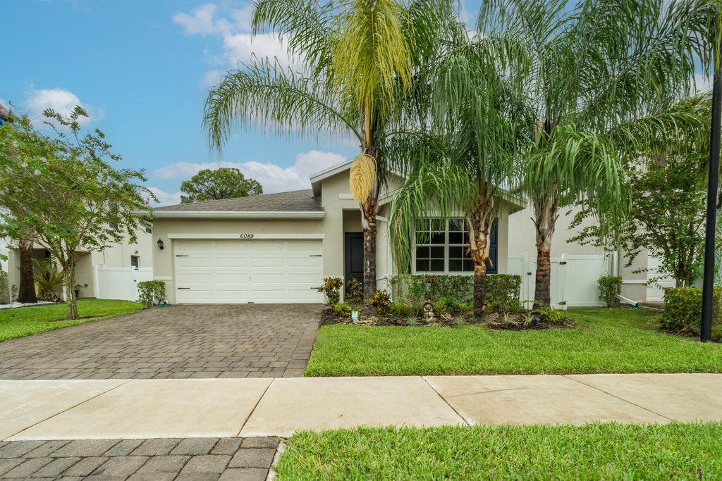 Photo of 6089 WILDFIRE Way, West Palm Beach, FL 33415 (MLS # B26077915)