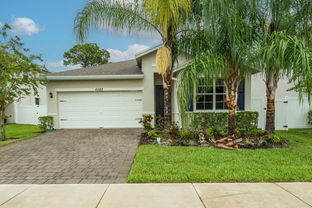 Photo of 6089 WILDFIRE Way, West Palm Beach, FL 33415 (MLS # B26077915)