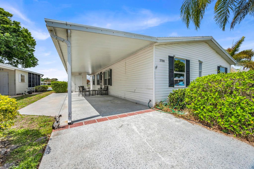 Photo of 3700 Fetterbush Court, Port Saint Lucie, FL 34952 (MLS # B26003203)