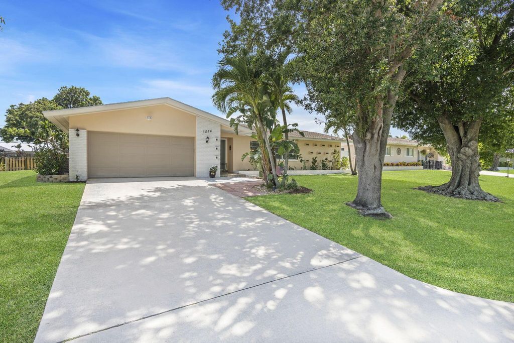 Photo of 3854 Buttercup Circle N, Palm Beach Gardens, FL 33410 (MLS # R10893837)