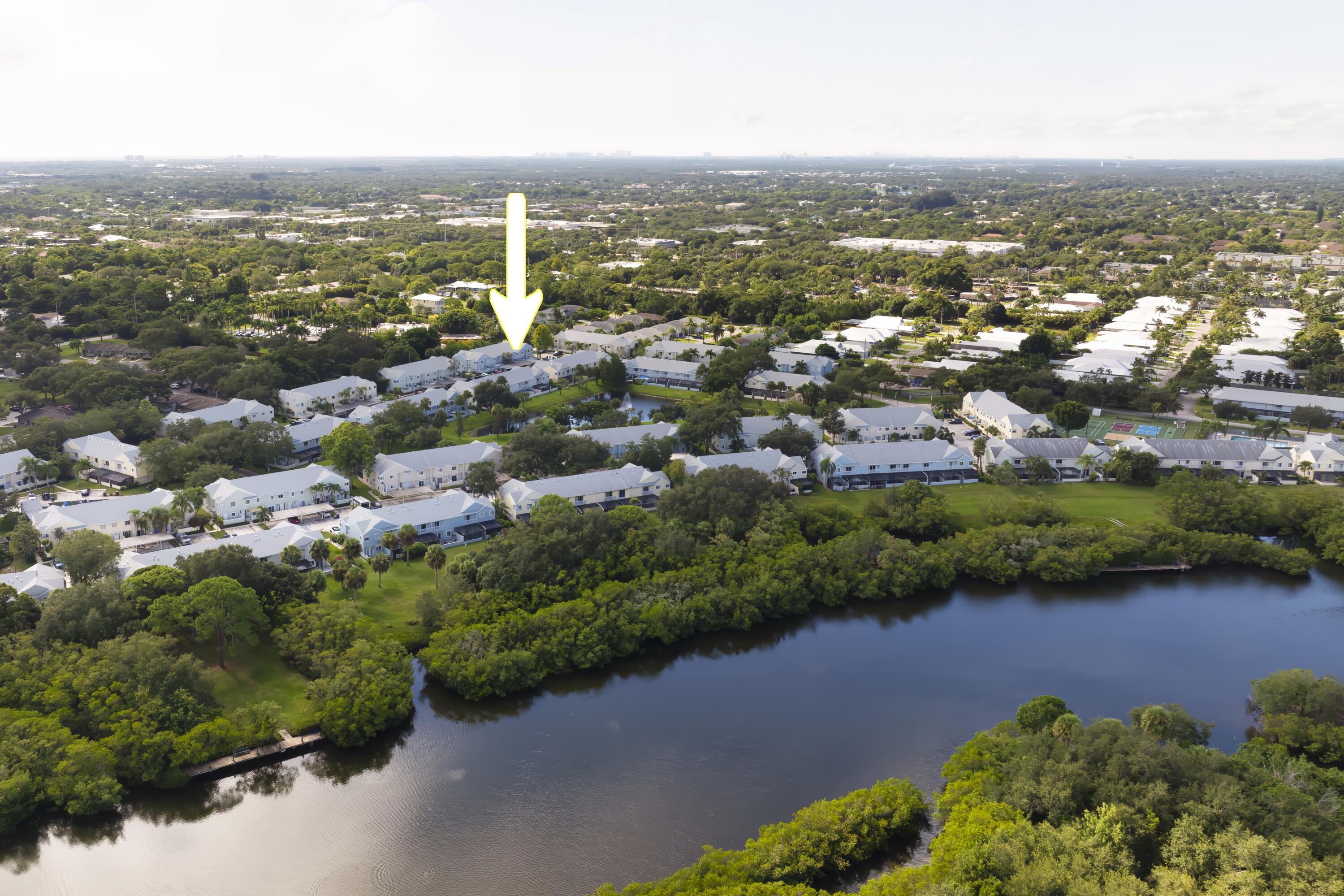 Live the Riverwalk lifestyle where coastal charm meets everyday ease. Enjoy granite kitchen counters, tile floors downstairs, wood laminate upstairs, covered parking, and a screened patio. The Hardi board exterior ensures lasting durability. Riverwalk offers 5 community docks, private boat storage, 3 pools, tennis & pickleball, clubhouse, oak tree canopy sidewalks perfect for strolling, and kayak & paddleboard storage. Big-dog friendly and just minutes from Jupiter's beaches, dining, and shopping. Here, neighbors become friends, sunsets are best enjoyed on the dock, and every day feels like a getaway.