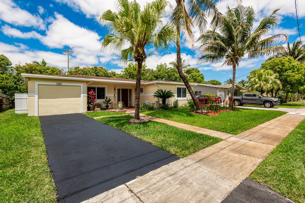 Photo of 3685 NW 43rd Place, Lauderdale Lakes, FL 33309 (MLS # B26018296)