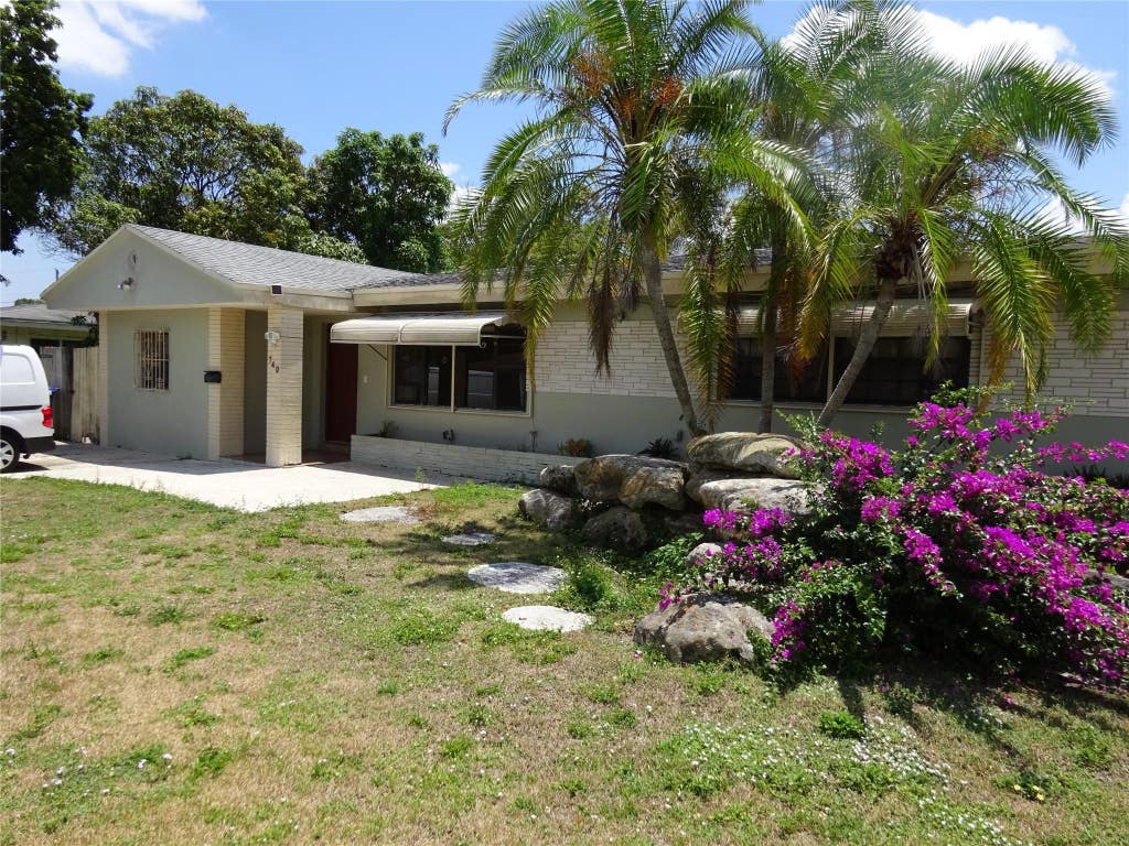 Photo of 740 E Evanston Circle E, Fort Lauderdale, FL 33312 (MLS # B26044144)