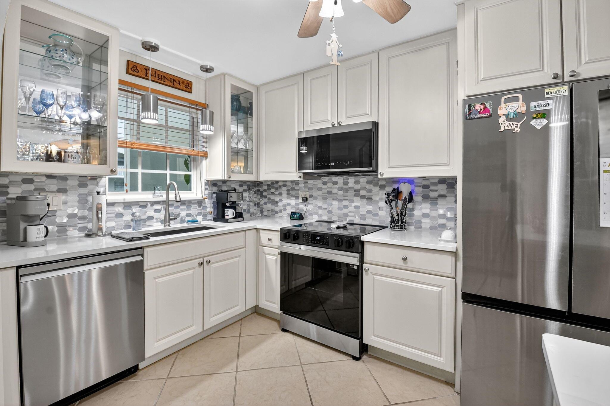 Welcome to waterfront living at sun-swept Unit 203 in beautifully-maintained French Village. This 1 Bedroom, 1.5 bath condo features a renovated kitchen with BRAND new SS appliances, 2024 AC & neutral tile throughout. Laundry & storage adjacent to condo. Internet included in HOA fee, pet-friendly and ALL assessments are PAID! Enjoy under-building parking, a putting green, shuffleboard courts and a newly renovated pool. Short waiting list for boat slips that accommodate up to a 30 ft boat and you're just minutes from the ICW via deep water canal with NO fixed bridges! Fabulous East location is a short drive to Downtown Boca Raton as well as, the lively Atlantic Avenue District in Delray Beach. 10 minutes to I95 with the BEST beaches, shopping, dining & entertainment just minutes away!