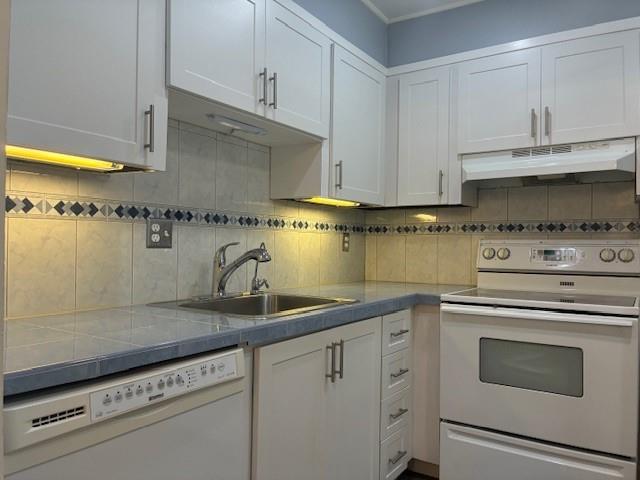 Welcome to carefree living in this charming 1-bedroom, 1-bathroom ground-floor unit located in a sought-after 55+ gated community. This well-maintained condo features a tankless water heater, dishwasher, and garbage disposal for modern convenience. Enjoy easy access with no stairs and a peaceful setting perfect for relaxing or entertaining.
Community amenities abound—including a 24/7 guard-gated entrance, swimming pool, clubhouse, pickleball and tennis courts, shuffleboard, a library, and even a storage locker on the second floor. Experience comfort, security, and an active lifestyle—all in one place!
