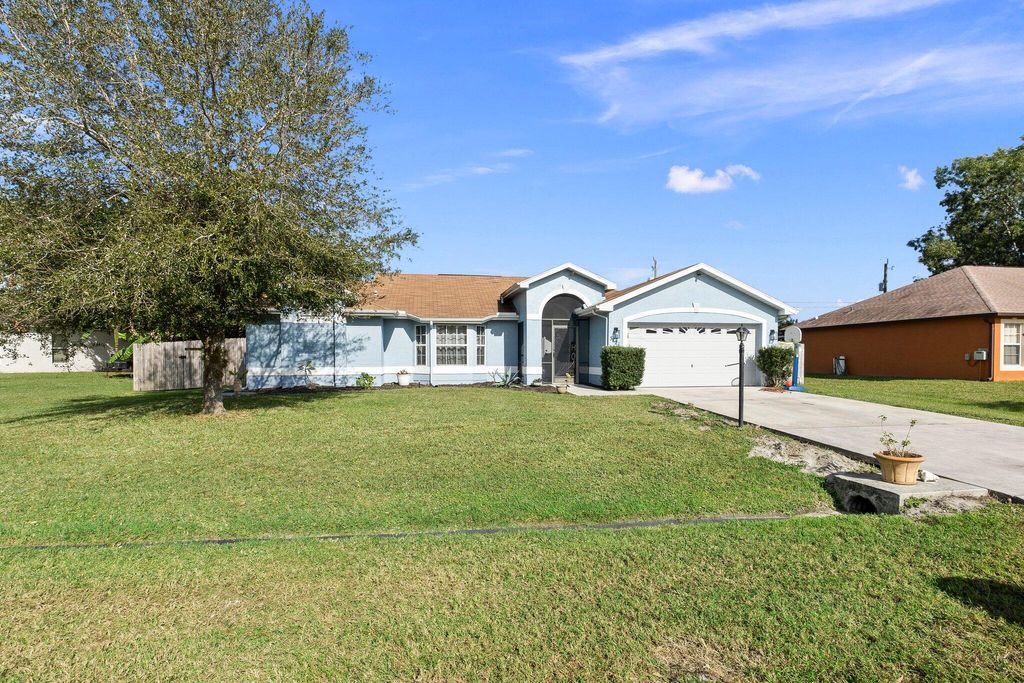 Photo of 5121 NW Ever Road, Port Saint Lucie, FL 34983 (MLS # R10947432)