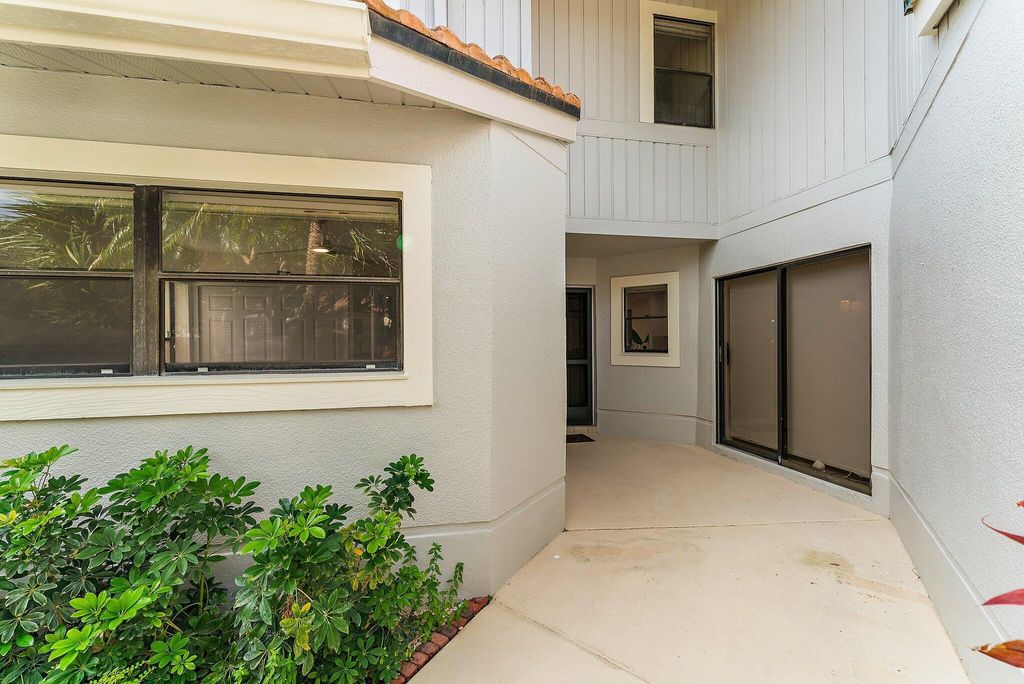 Photo of 551 Prestwick Circle, Palm Beach Gardens, FL 33418 (MLS # R11017263)