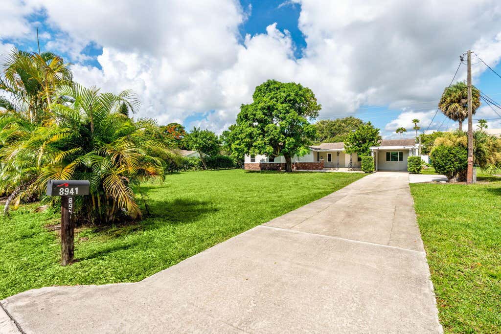 Photo of 8941 Sunset Drive, Palm Beach Gardens, FL 33410 (MLS # R11115132)