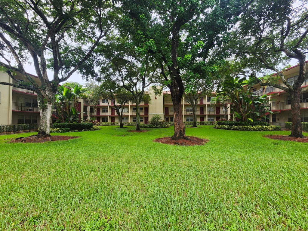 Photo of 200 SW 132ND Way #105L, Pembroke Pines, FL 33027 (MLS # B26074417)