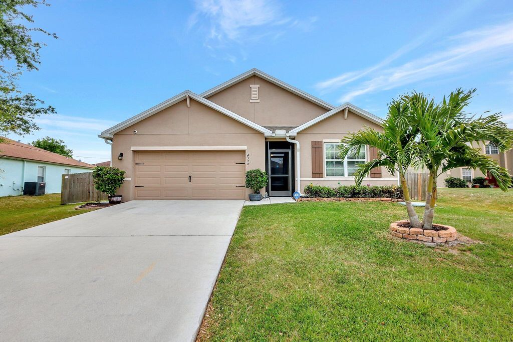 Photo of 4520 SW Oscar Court, Port Saint Lucie, FL 34953 (MLS # R10974839)