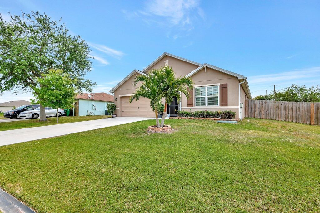 Photo of 4520 SW Oscar Court, Port Saint Lucie, FL 34953 (MLS # R10974839)