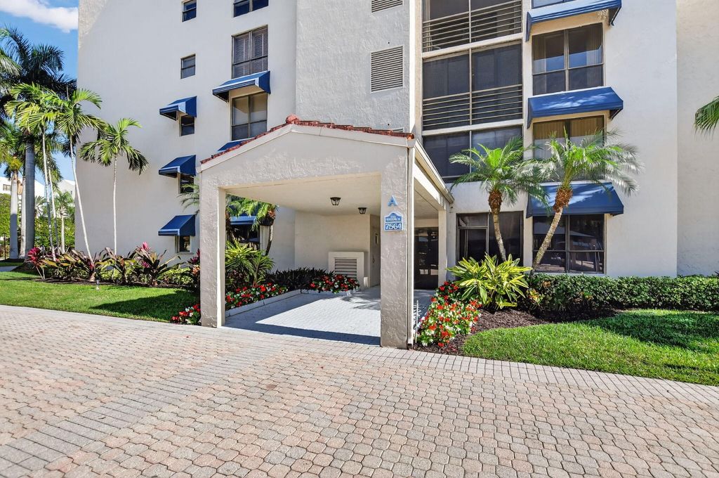 Photo of 7564 Regency Lake Drive #701, Boca Raton, FL 33433 (MLS # R11145434)