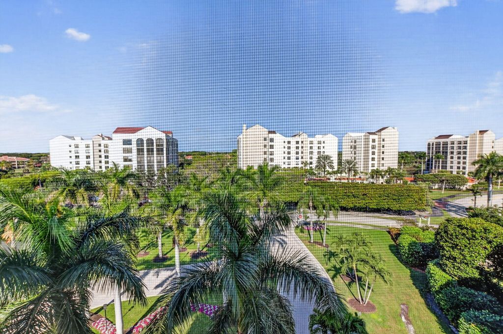 Photo of 7564 Regency Lake Drive #701, Boca Raton, FL 33433 (MLS # R11145434)